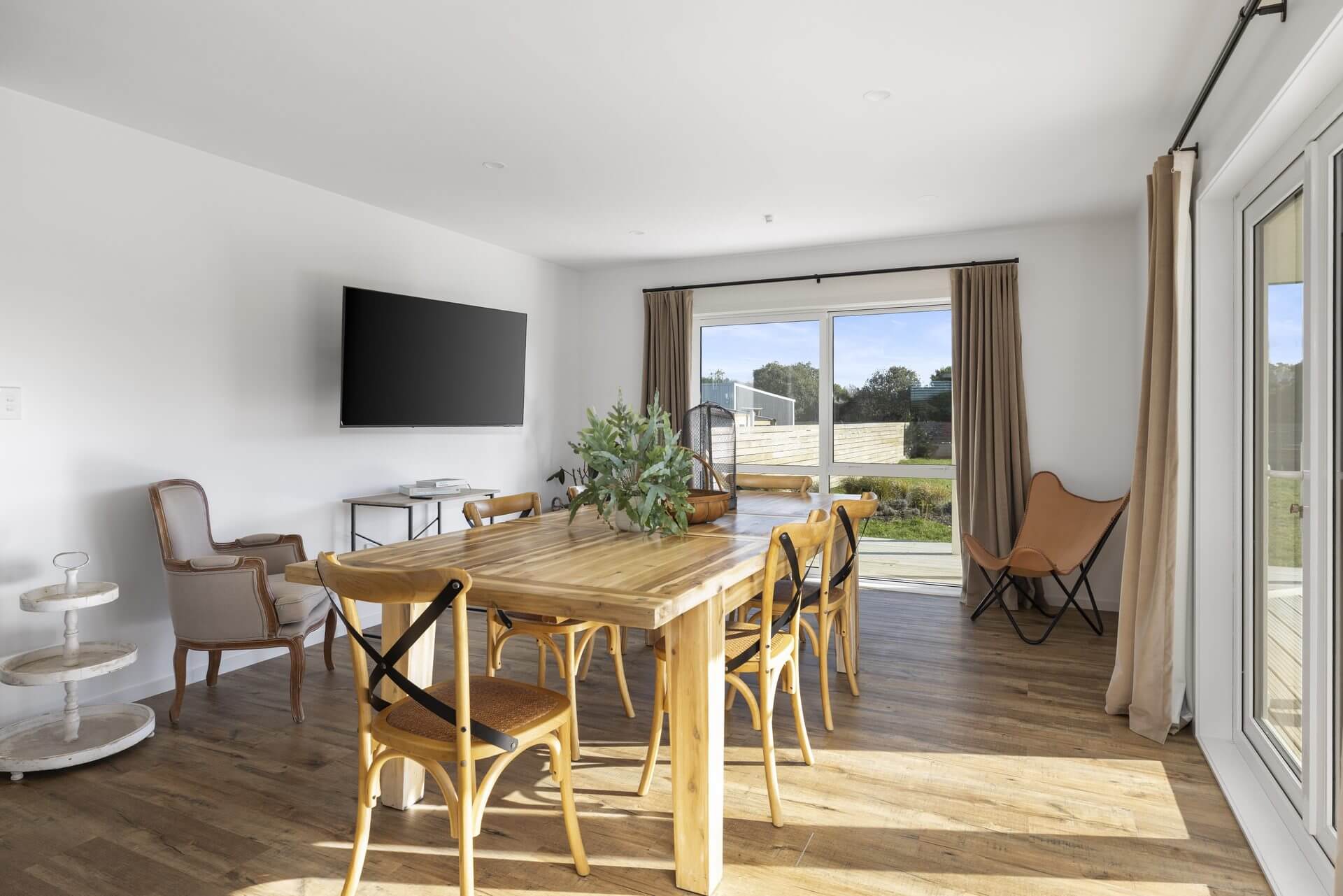 Renovated dining room double sliding doors leading to deck