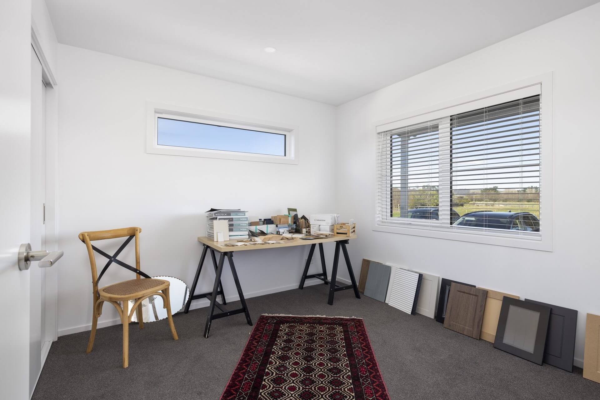 White painted newly renovated office with cabin floors